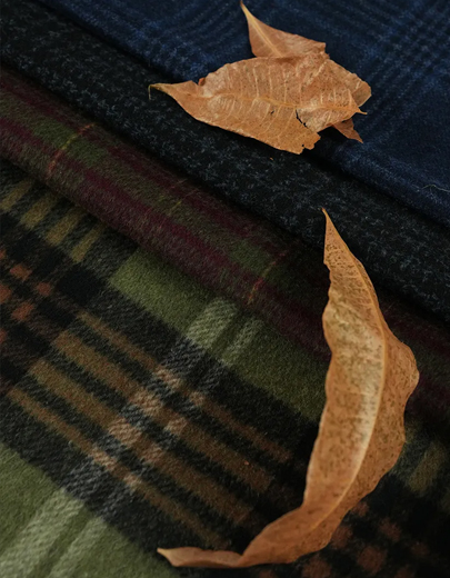 기술 평가: 양면 울 오버코트의 열 효율 및 구조적 완전성